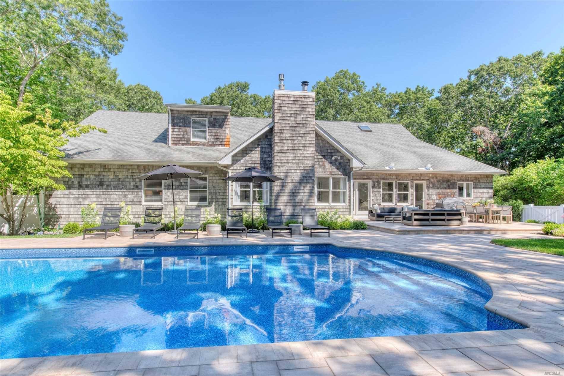 This is the full package recently renovated with 7328 square feet on over an acre of land and six en suite bedrooms with multiple living spaces on three levels.