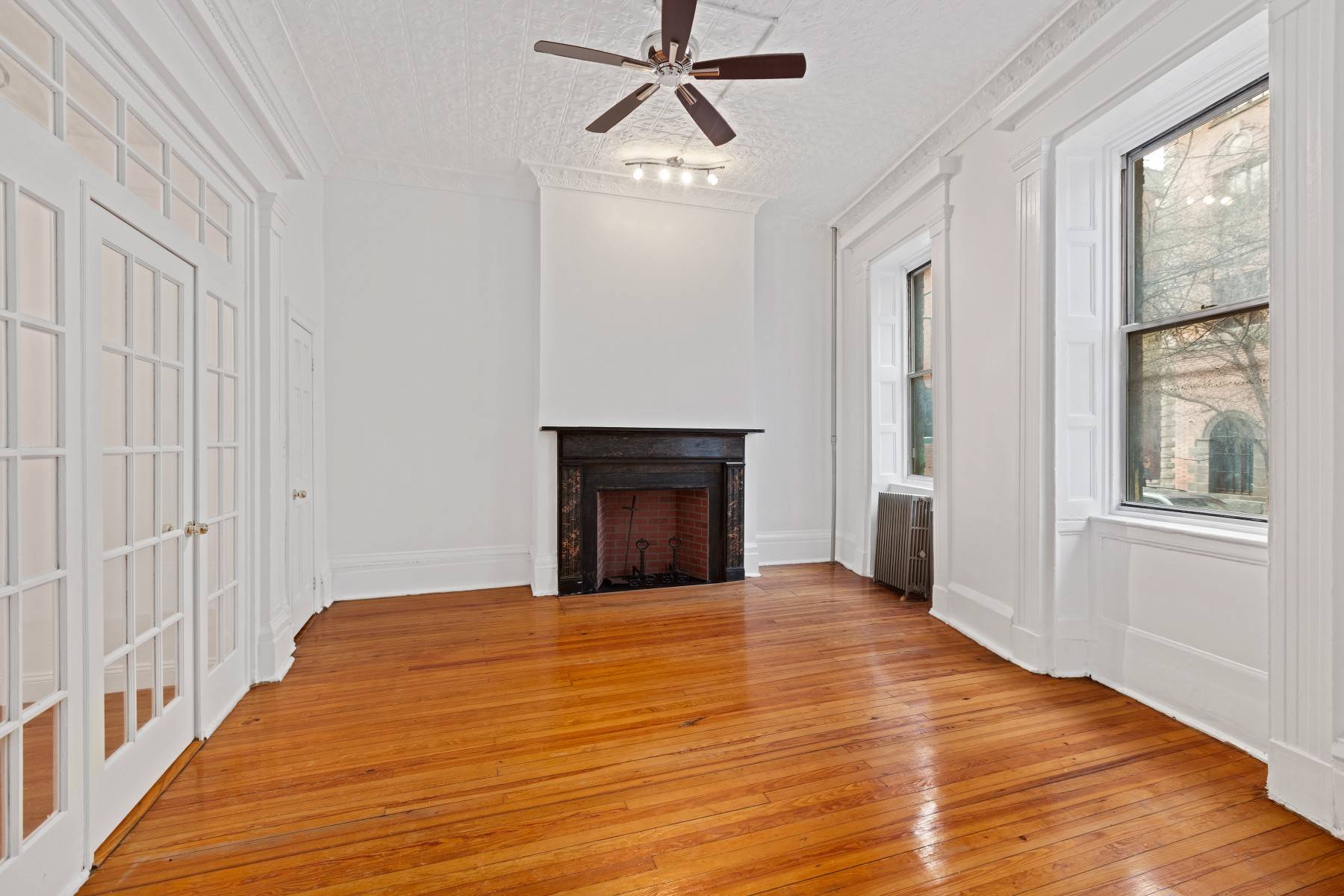 Large 1 bedroom, 1 bathroom is on the 1st floor features original details with crown moldings.