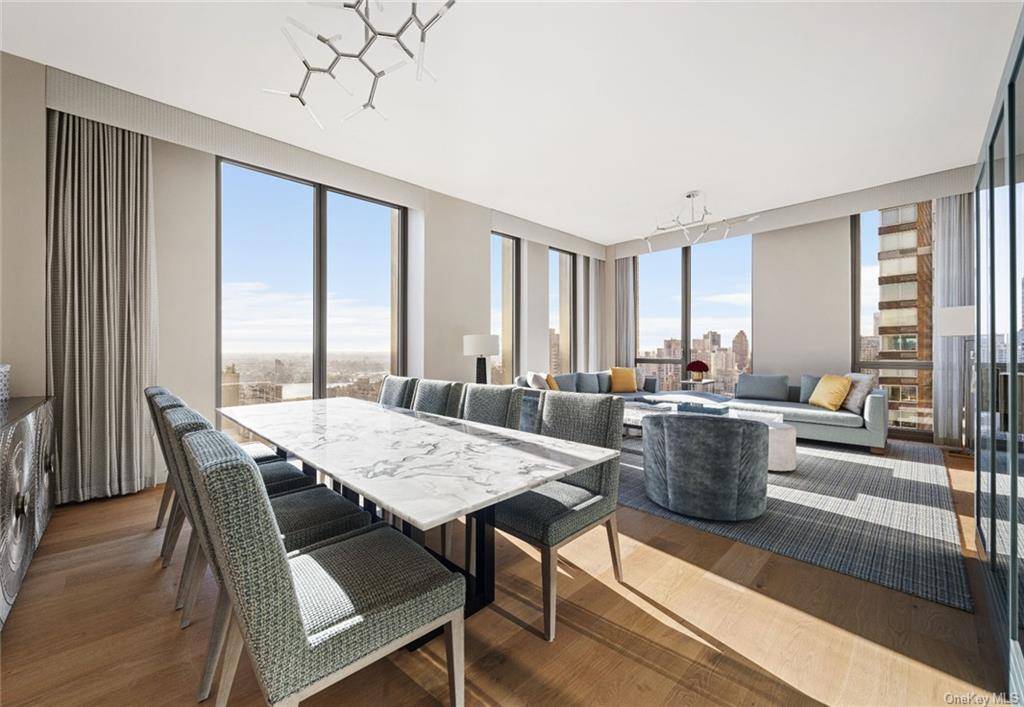 Perched high on the 31st floor, a walnut entry door and a white oak foyer welcome you to this luxurious residence featuring three bedrooms, three baths and a powder room.
