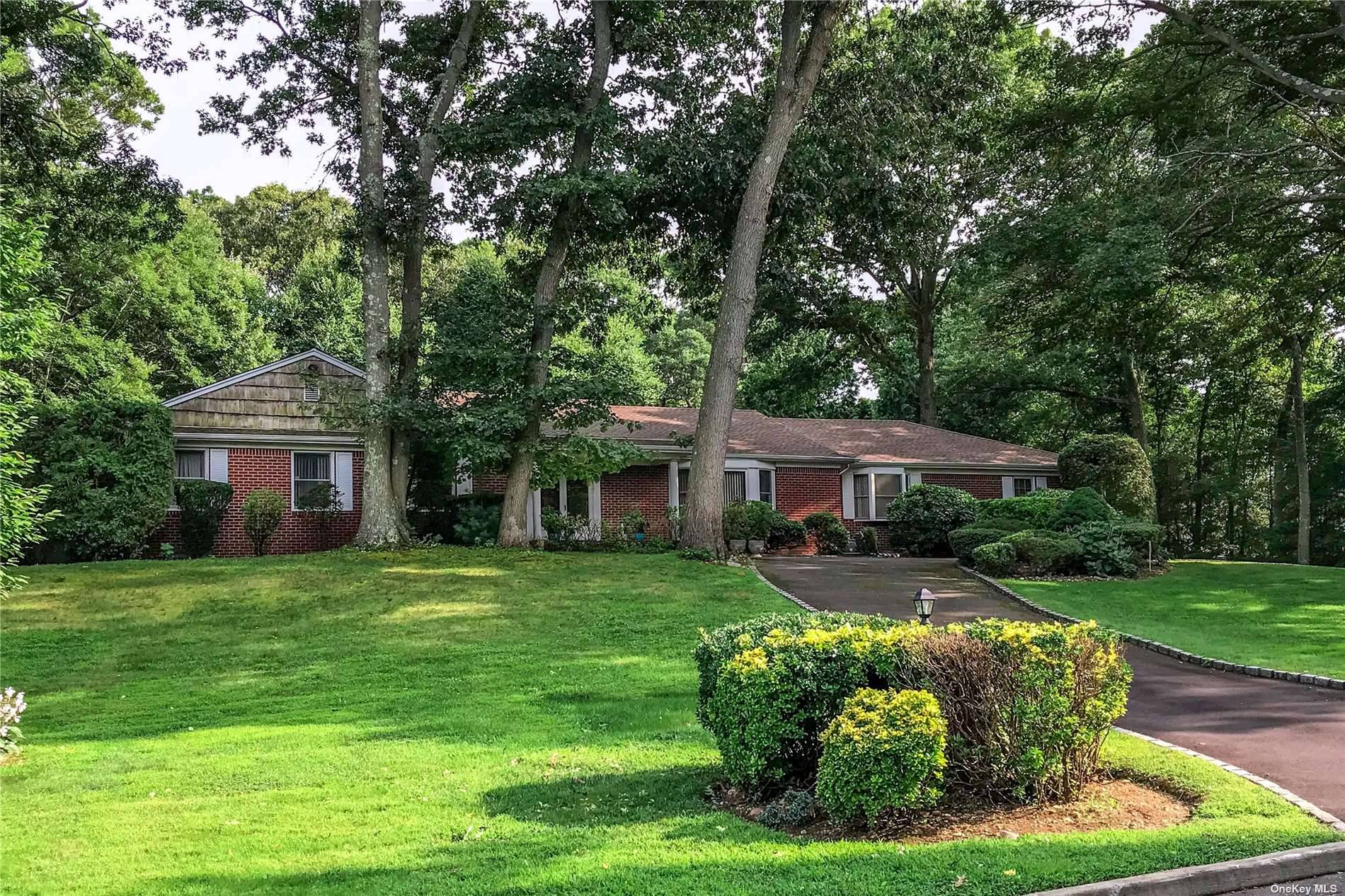 Sprawling Brick Ranch located in North Syosset at the end of a quiet cul de sac.