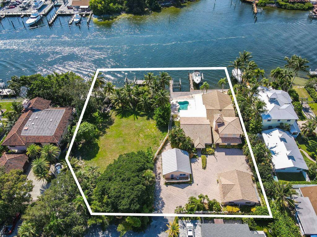 A private sanctuary is being offered at this double lot investment opportunity comprising 2103 2105 Cove Lane, directly on the Intracoastal Waterway with over 204 feet of waterfrontage.