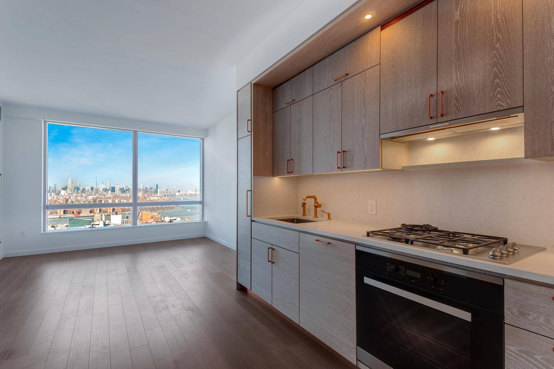 Residence 50C is a spacious, two bedroom home with oversized windows and unparalleled views of the Manhattan skyline and waterways.