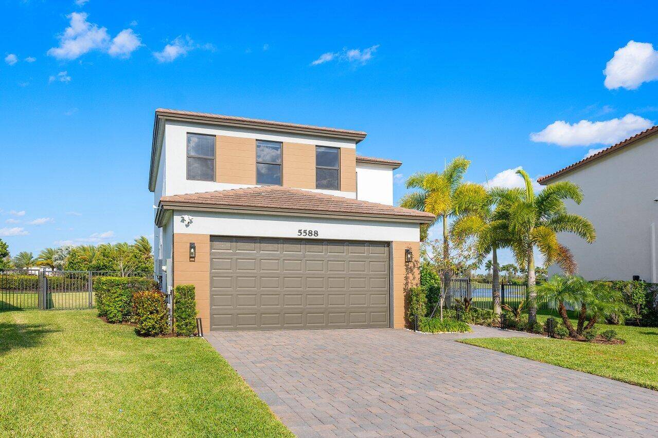 Welcome to this rare lot size and stunning waterfront Sand Dollar 5 Model located in the highly sought after Sky Cove neighborhood of Westlake.