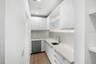 Kitchen hosts a hidden scullery in the kitchen