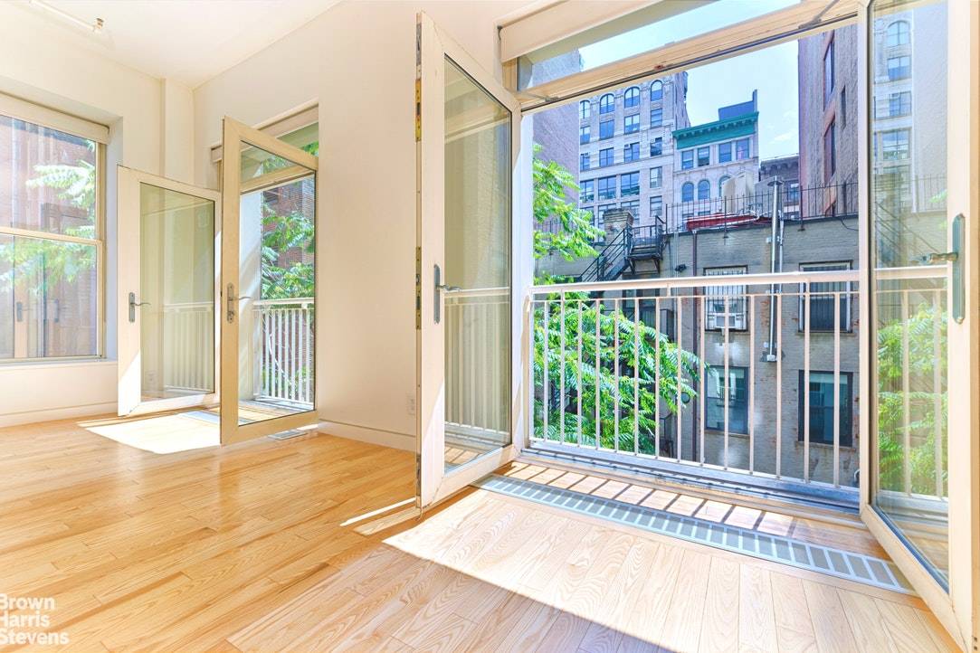 RARE DOWNTOWN LOFT GEM ! Located in the coveted Flatiron District at an unbeatable address, this south facing, sun flooded, 1 bedroom loft sprawls a magnificent 922 square feet with ...