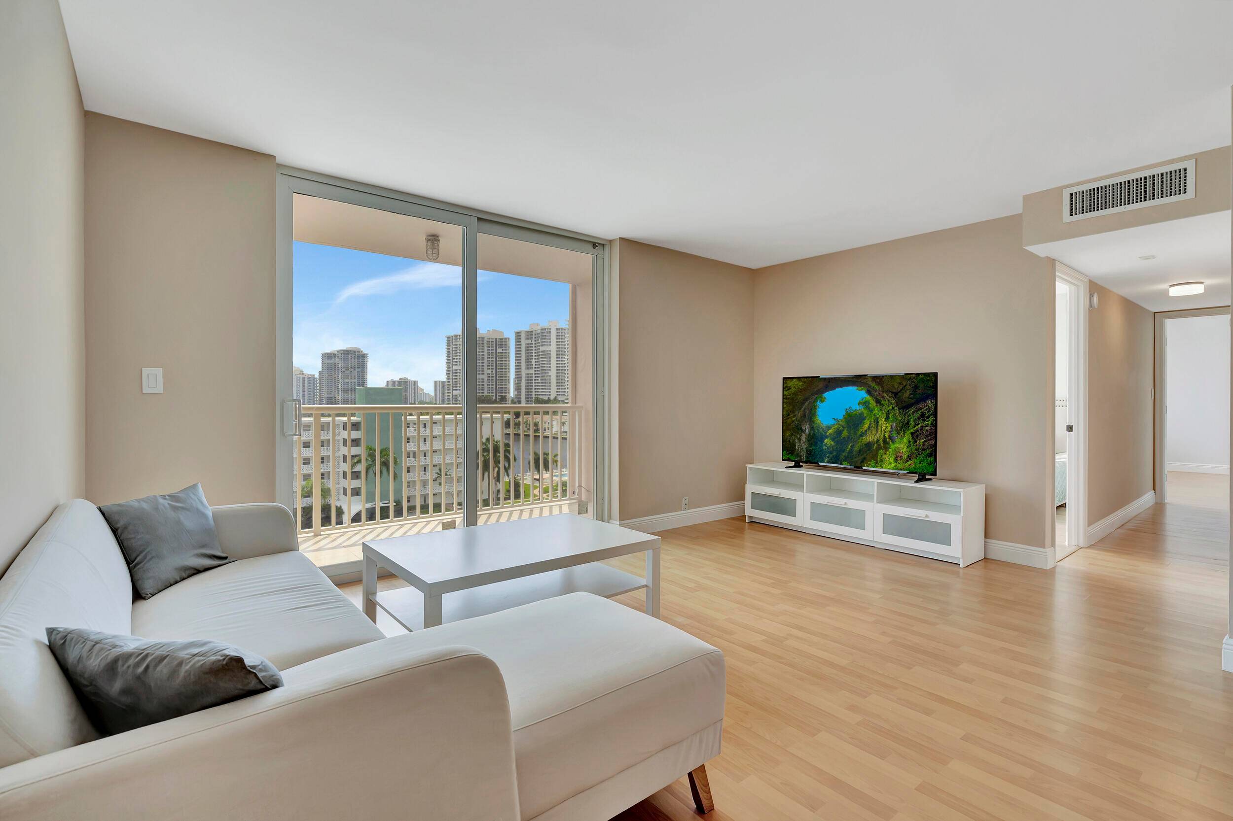 UTILITIES INCLUDED ! Wake up every morning to the stunning panoramic views of Sunny Isles, Aventura and Miami from every window in the beautifully remodeled 2bd 2bath unit located on ...