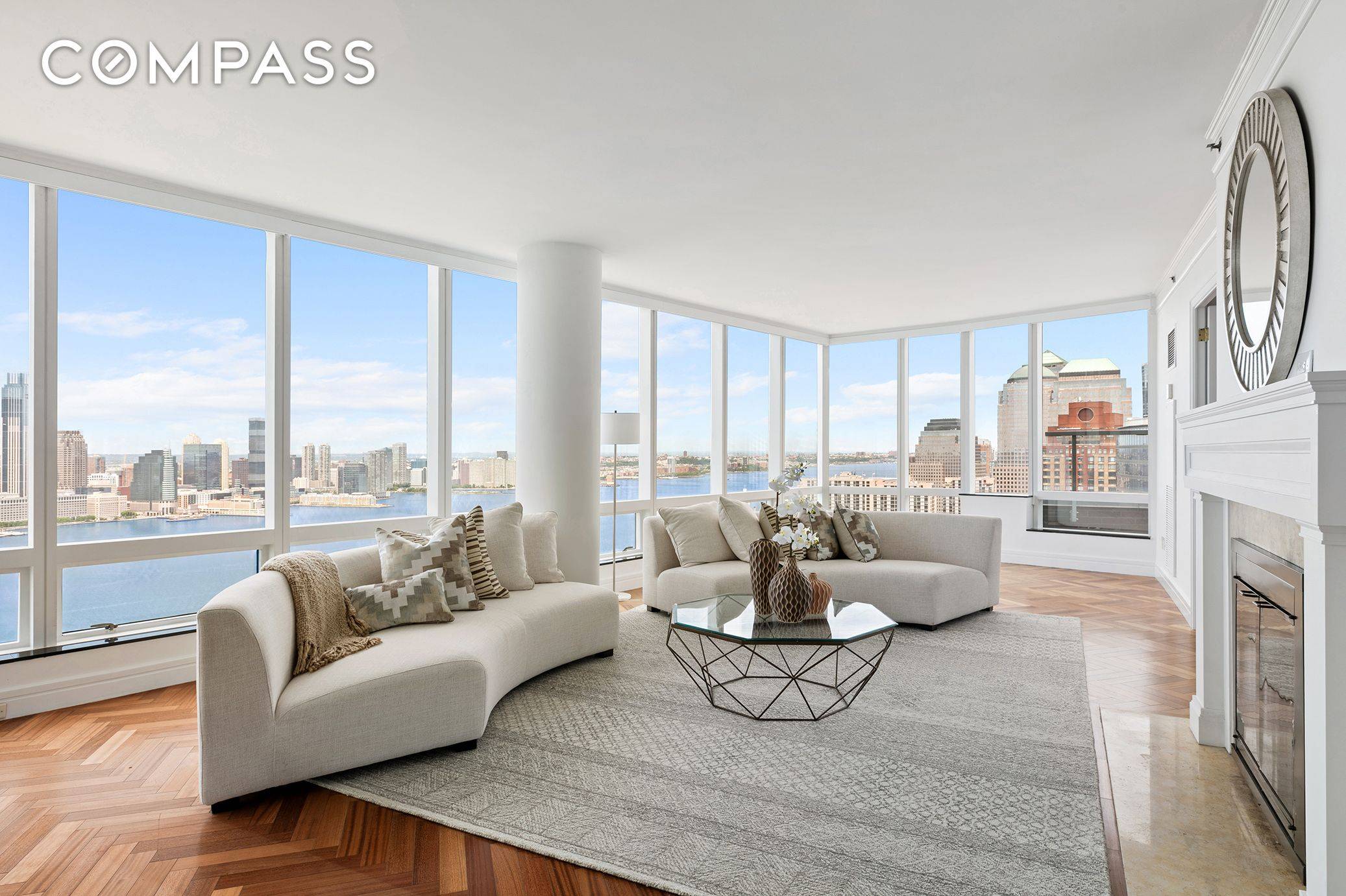 Endless blue water and skyline views surround you in this four bedroom, five bathroom duplex penthouse home creating an inviting, high floor oasis in one of Battery Park City's most ...