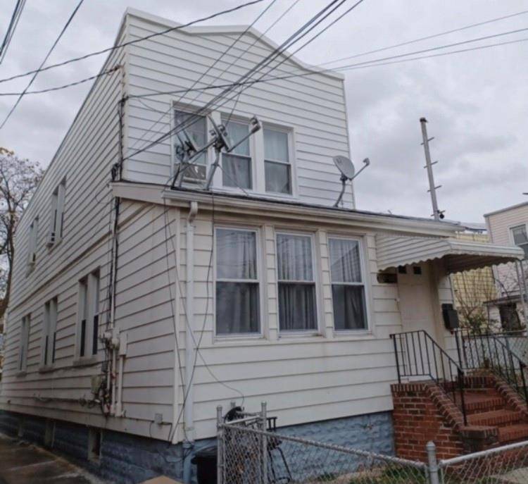 Two 2 Family House in good condition, Semi Detached, Two 2 over two Bedrooms, Two baths, Two Kitchens, Appliances, Hardwood Flooring throughout, finished basement with separate entrance, close to Transportation ...