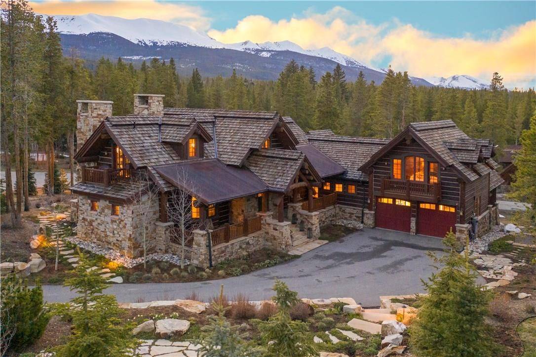 Step into the heart of Shock Hill, with its stunning views of Peak 8 and the Ten Mile Range paint the backdrop of this extraordinary residence.