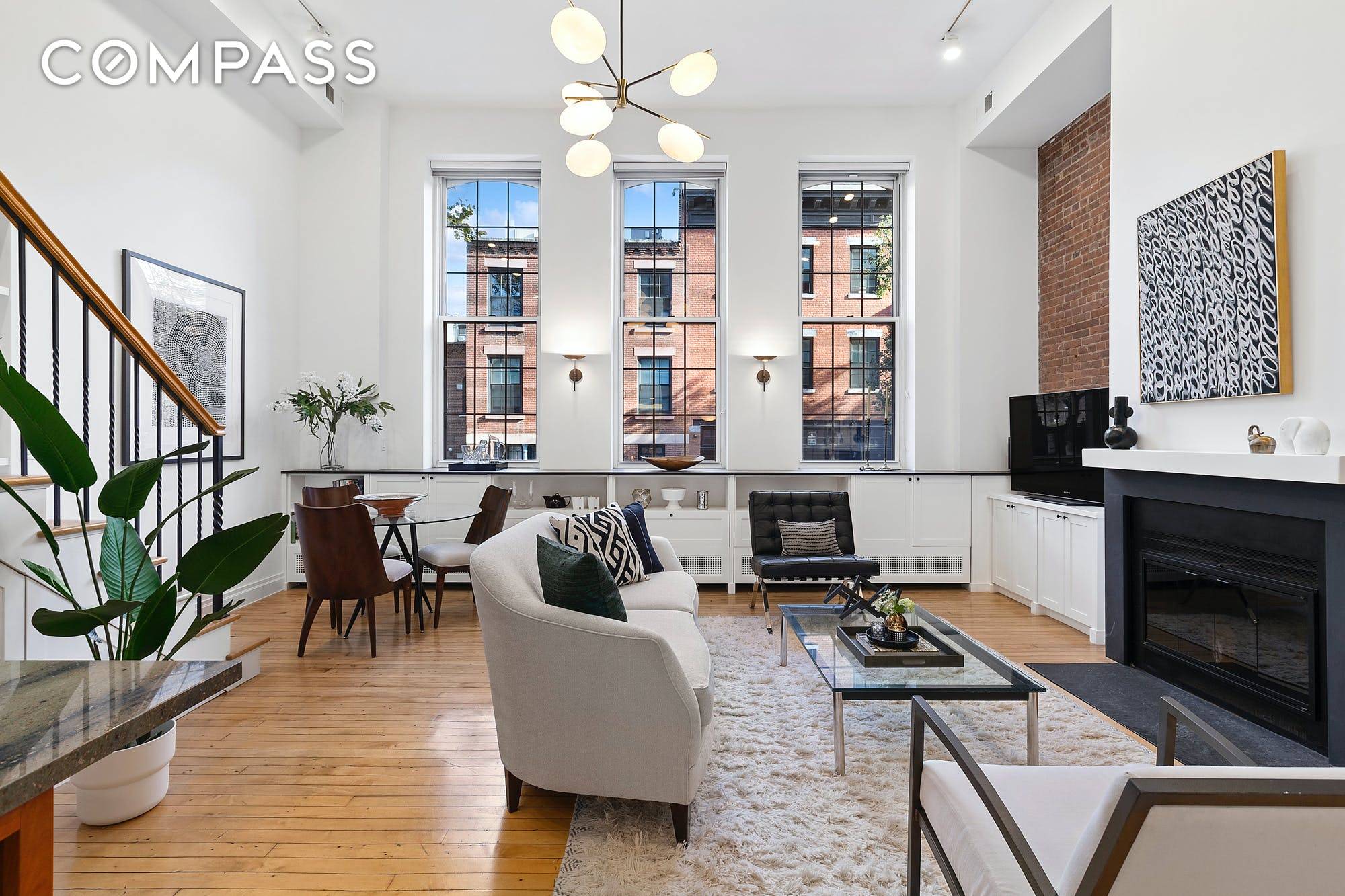 A renovated three bedroom triplex designed by renowned architects Baxt Ingui with private parking in a landmarked, turn of the century former schoolhouse in prime Cobble Hill.