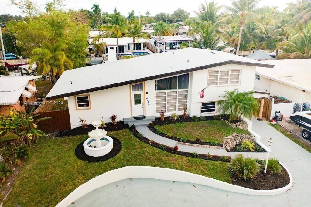 This beautiful waterfront home in Lauderdale Isles is a must see !