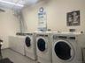 Community laundry with separate washer and dryer