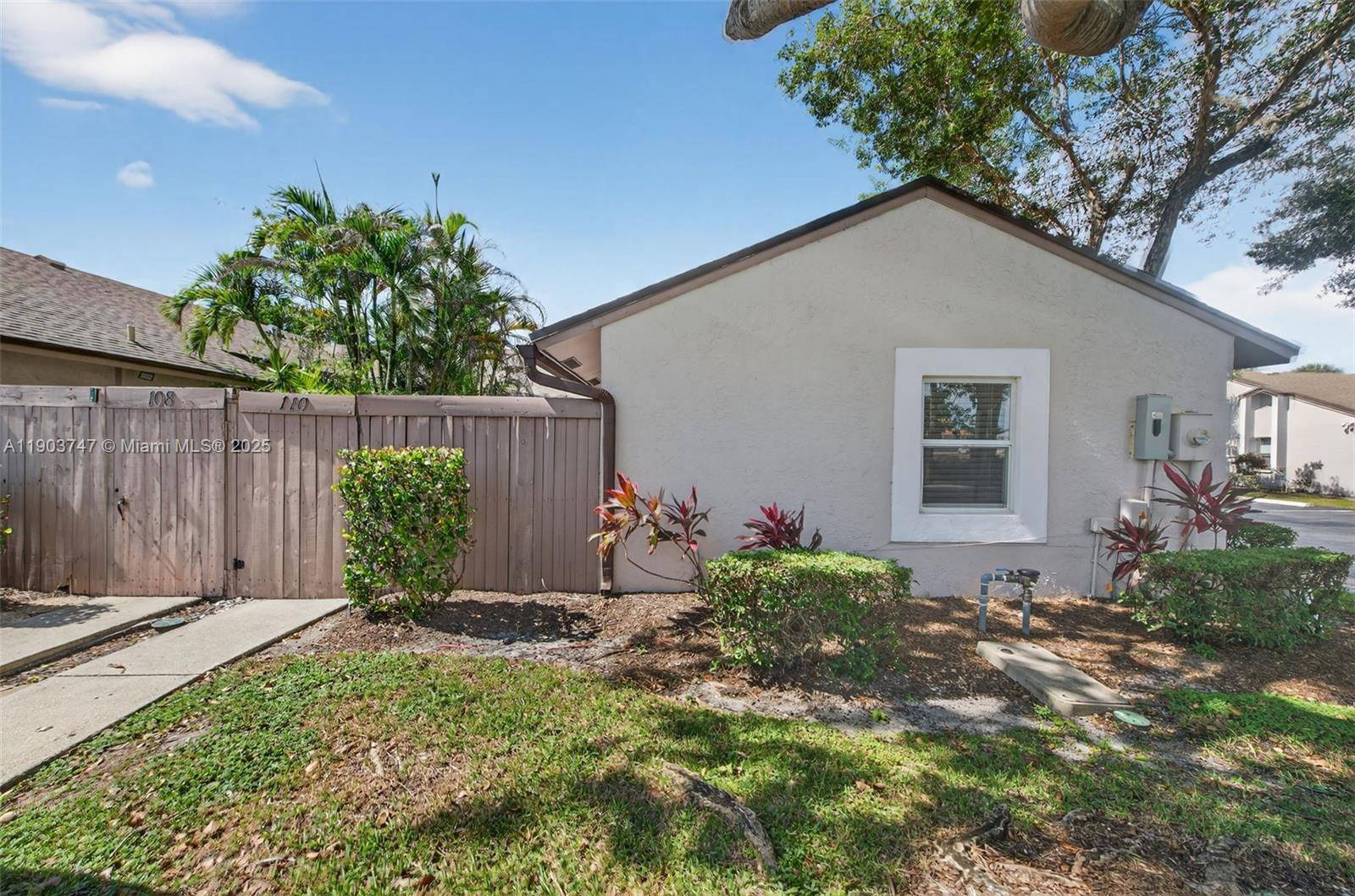 Beautifully updated 2 bedroom, 2 bath villa with an open floor plan, modern finishes, and stainless steel appliances.