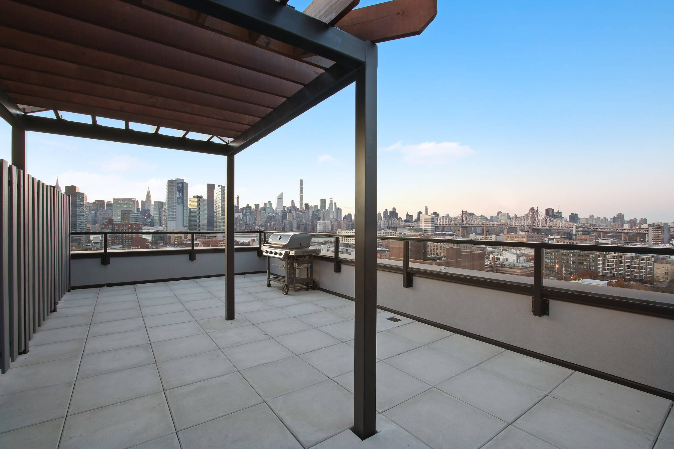 This SPECTACULAR three bedroom, two bathroom Condo with balcony has breathtaking SUNSET VIEWS of Manhattan.