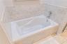 Dual sinks, soaking tub and separate shower- designed for comfort.