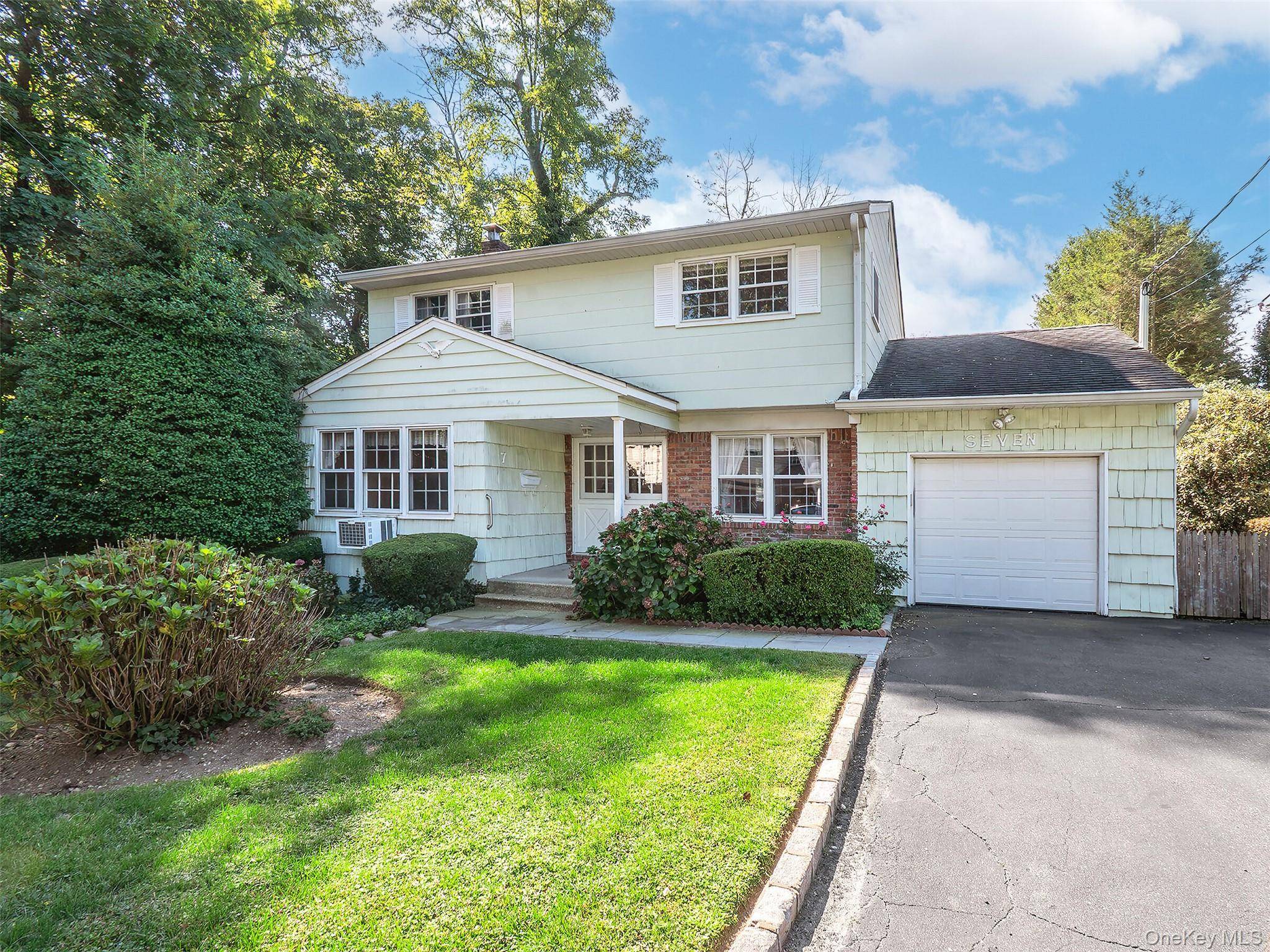 Nestled on a quiet cul de sac, this 3 bedroom, 1.