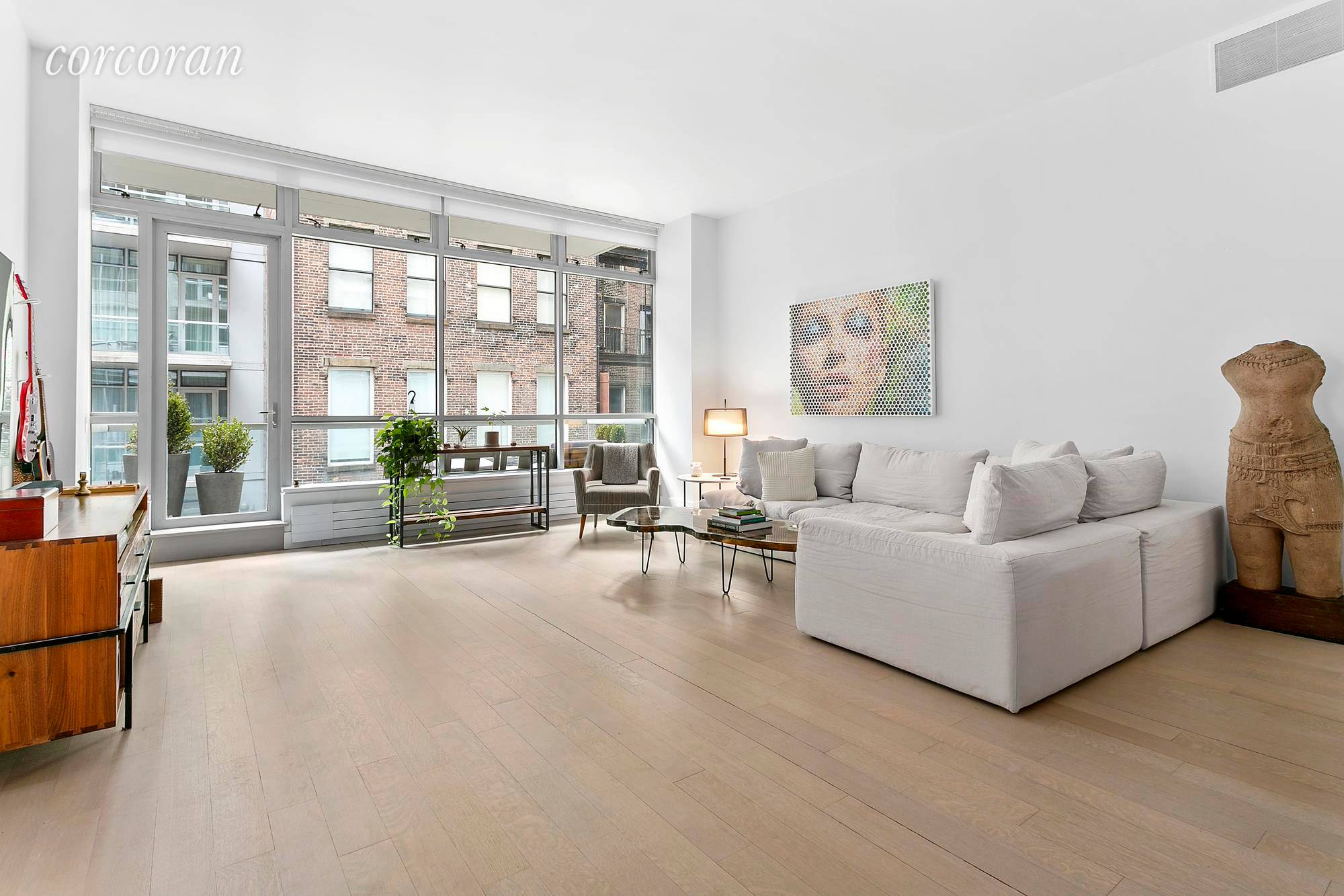 PRICE REDUCED ! Apt 3B at 139 Wooster is a true modern loft with two generous bedrooms in one of SOHO's few full service buildings !