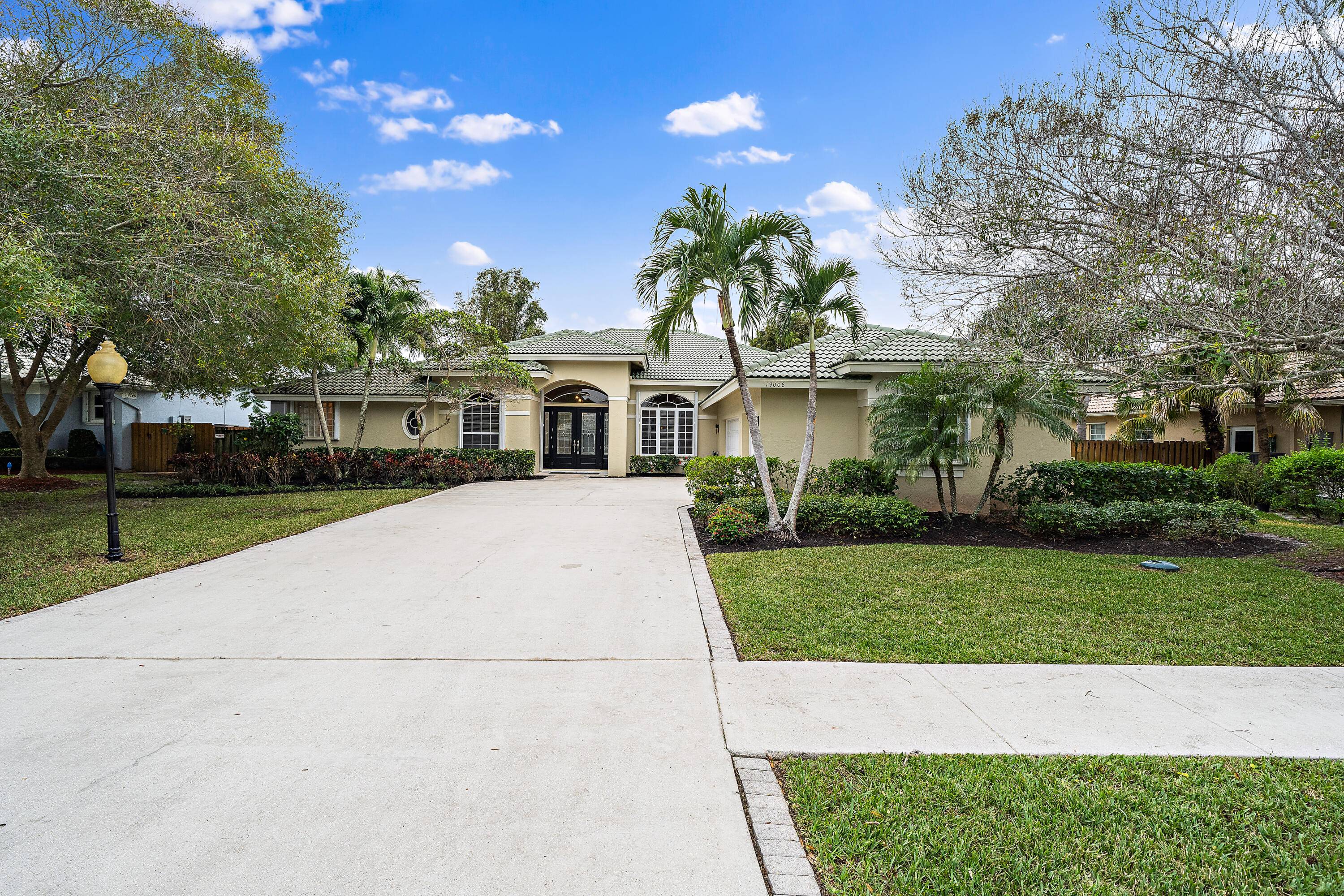 This 4 bedroom, 3. 5 bathroom home with a private screened in pool is located on a quiet sidestreet in the very desirable Moorings neighborhood in North Jupiter.