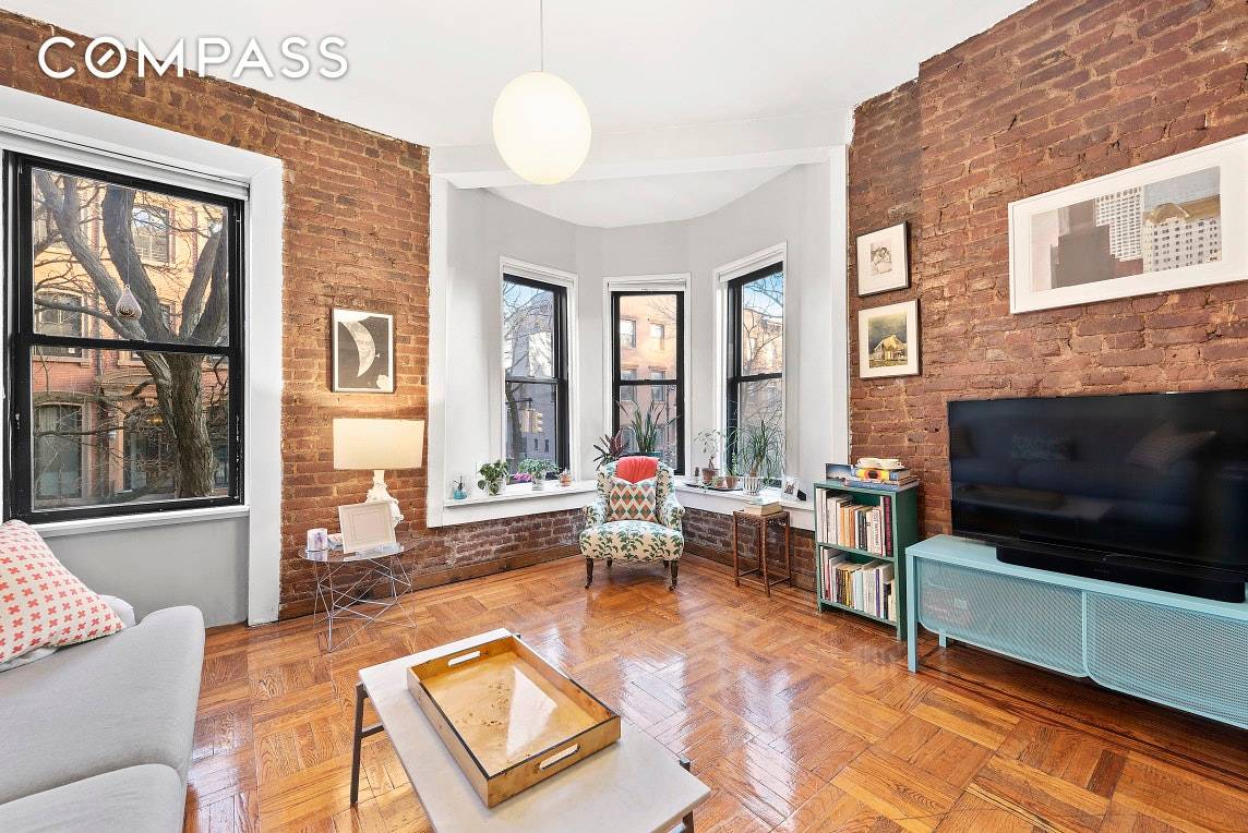 A beautiful and spacious corner two bedroom with a formal dining room and W D in prime Cobble Hill.