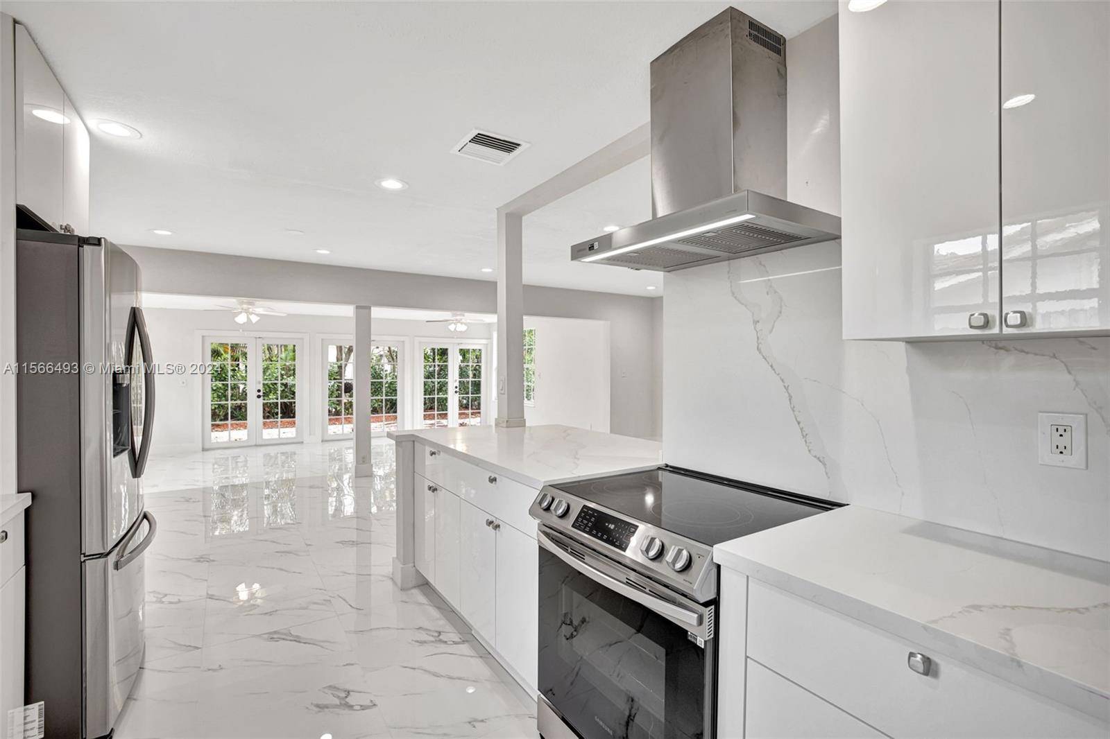 Gorgeous Imperial Point Renovated Home w open floor plan, great room w New Quartz Gourmet Kitchen high end Cabinets, hi end Samsung Stainless Steel Appliances.