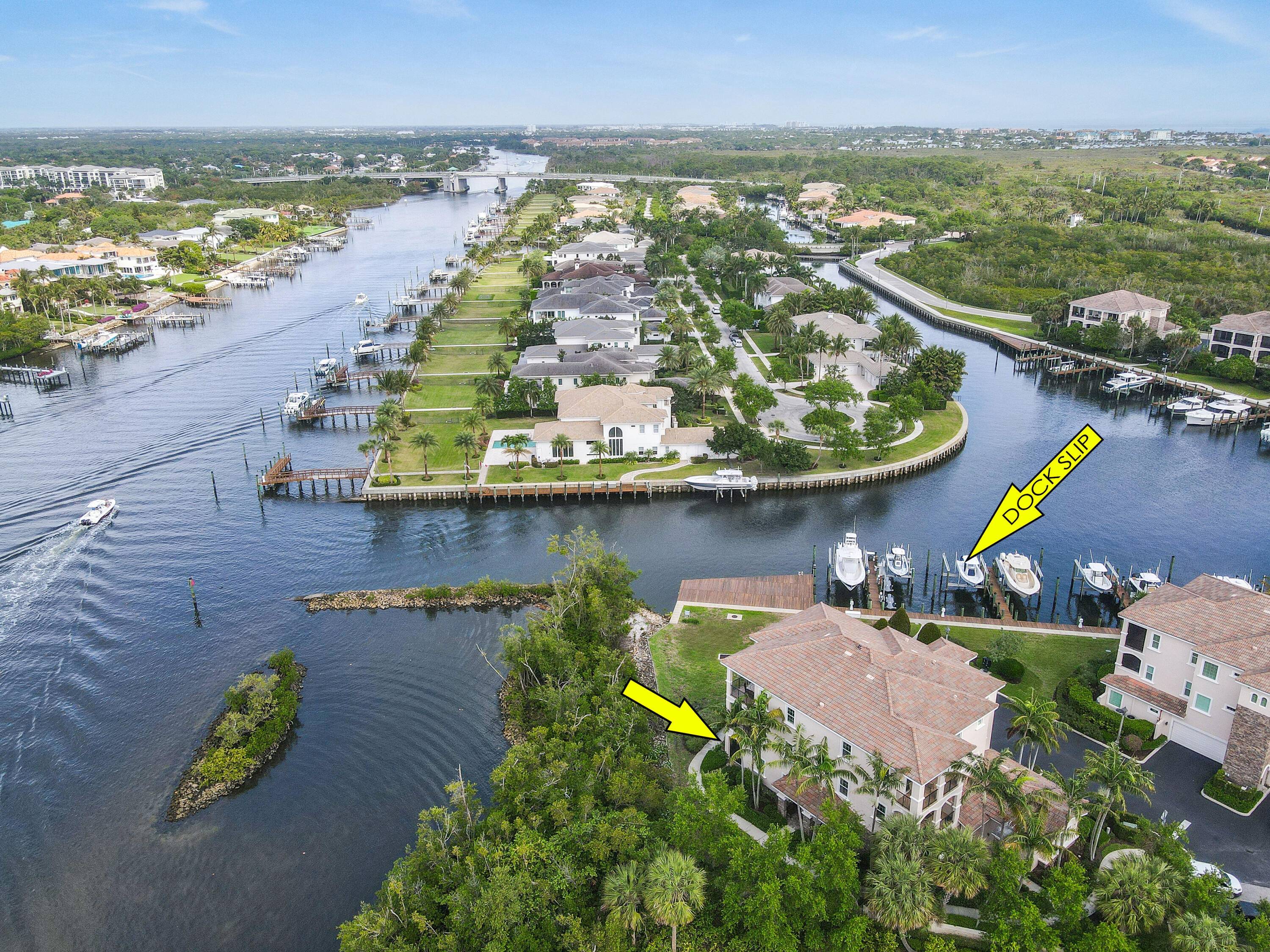 A Boater's Paradise, First Floor Carriage Home with a Private Boat Slip and Direct Intracoastal Access, nestled in the exclusive enclave of Frenchman's Harbor !