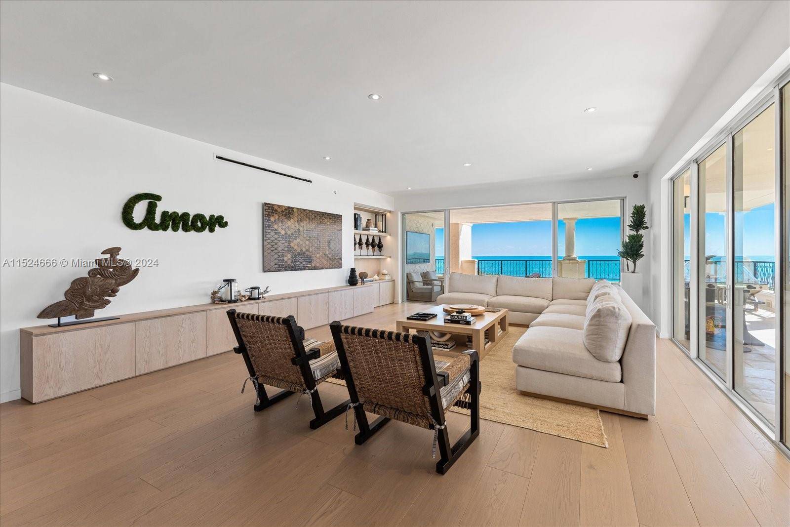 Introducing the epitome of luxury living on Oceanside, Fisher Island Magnificent 5th floor corner unit boasting rare direct ocean AND Miami Downtown skyline views.