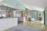 From the Florida Room and Dining Area enjoy the OPEN Floor Plan and immediate access to Kitchen and Living Spaces