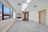 Empty room with a drop ceiling