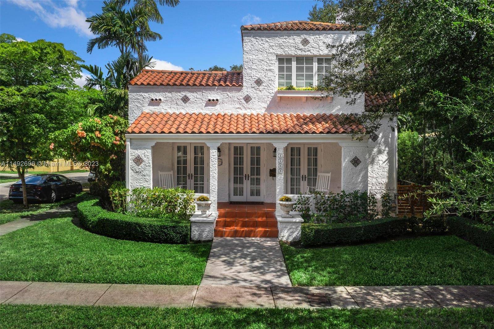 Captivating Spanish style family home on a corner lot !