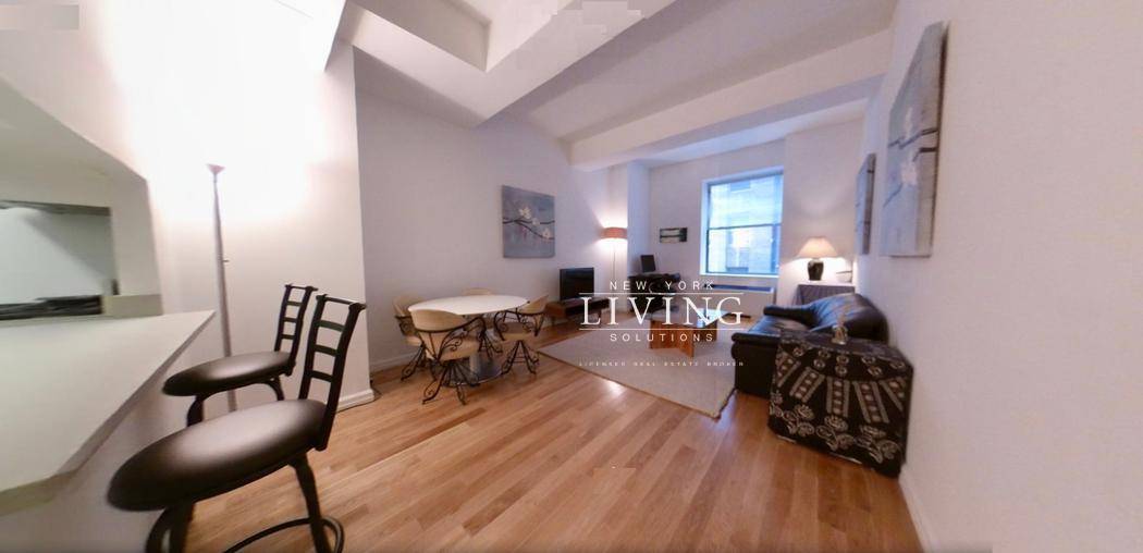 Huge luxury condo loft apartment 660sf The Alcove easily fits a Queen size bed and this space has its own closet.