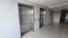 Corridor featuring elevator, tile patterned floors, crown molding, and a paneled ceiling
