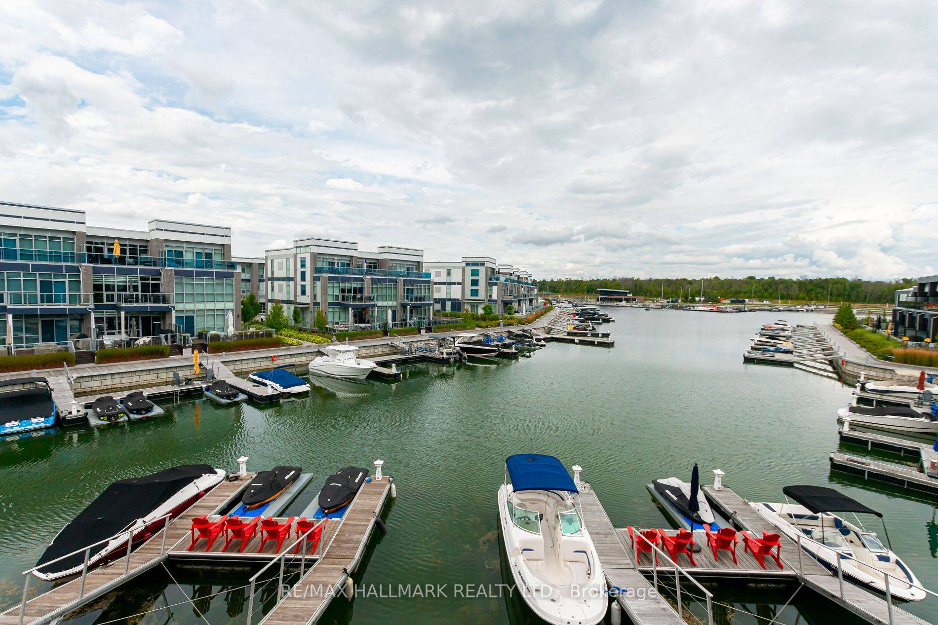 Enjoy unobstructed marina views from the comfort of your living room and primary bedroom !