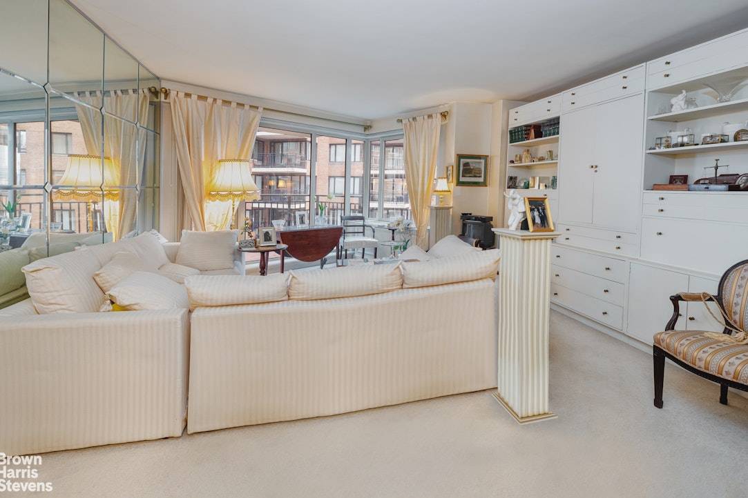 Sunny and spacious one bedroom home in Sutton Place's best post war building.