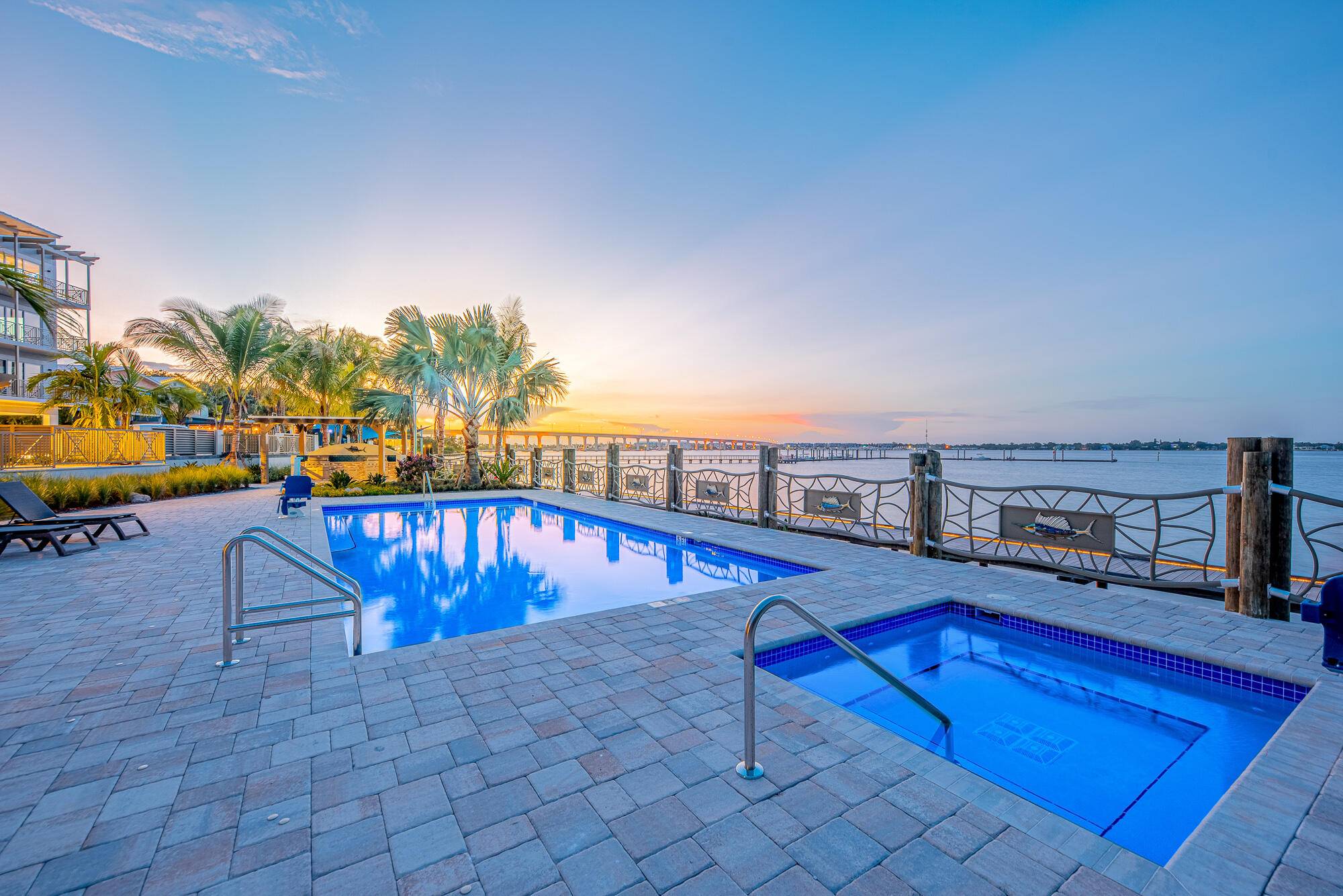 Enjoy Florida Living at its finest in this brand new, direct riverfront, fully furnished corner unit !