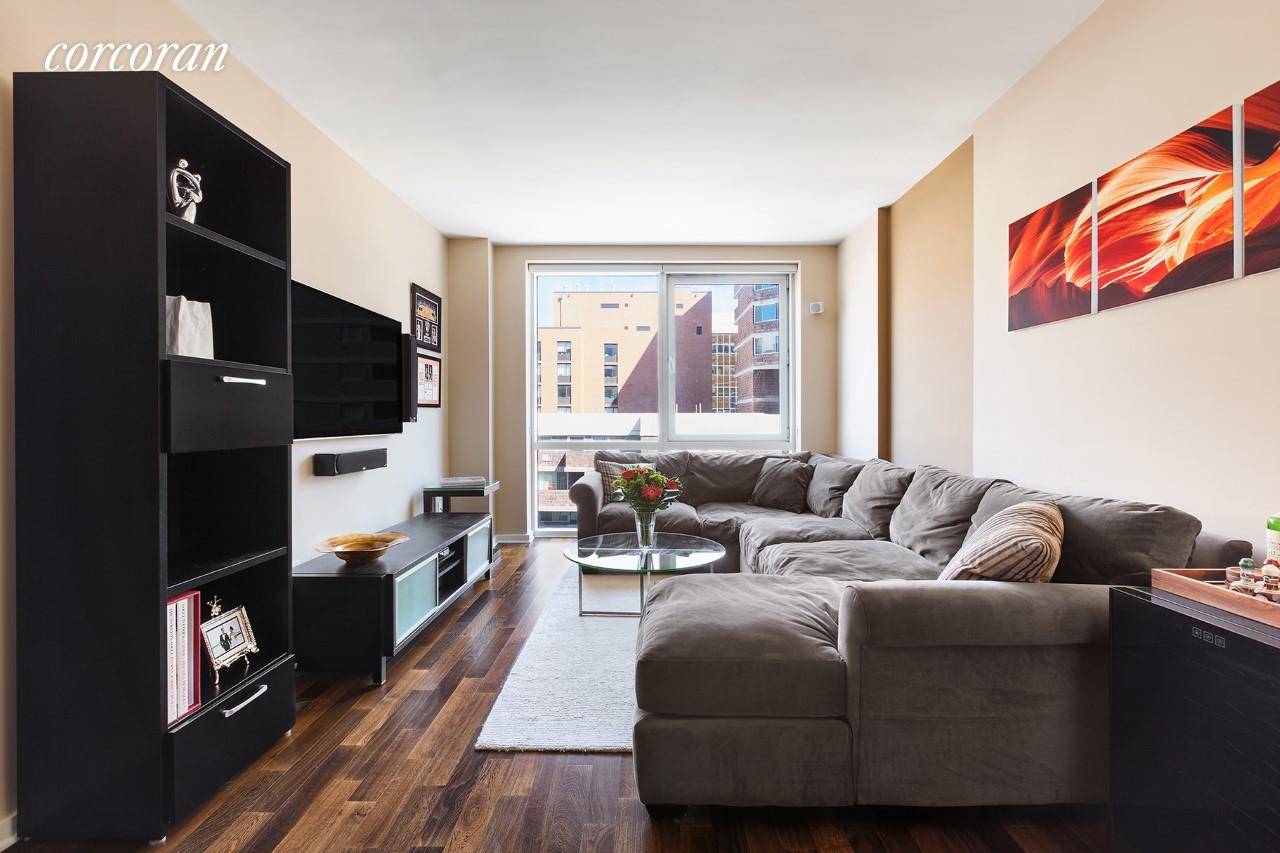 This luxurious and spacious 1 bedroom at The Gramercy by Starck features floor to ceiling windows and beautifully finished dark oak wood floors.