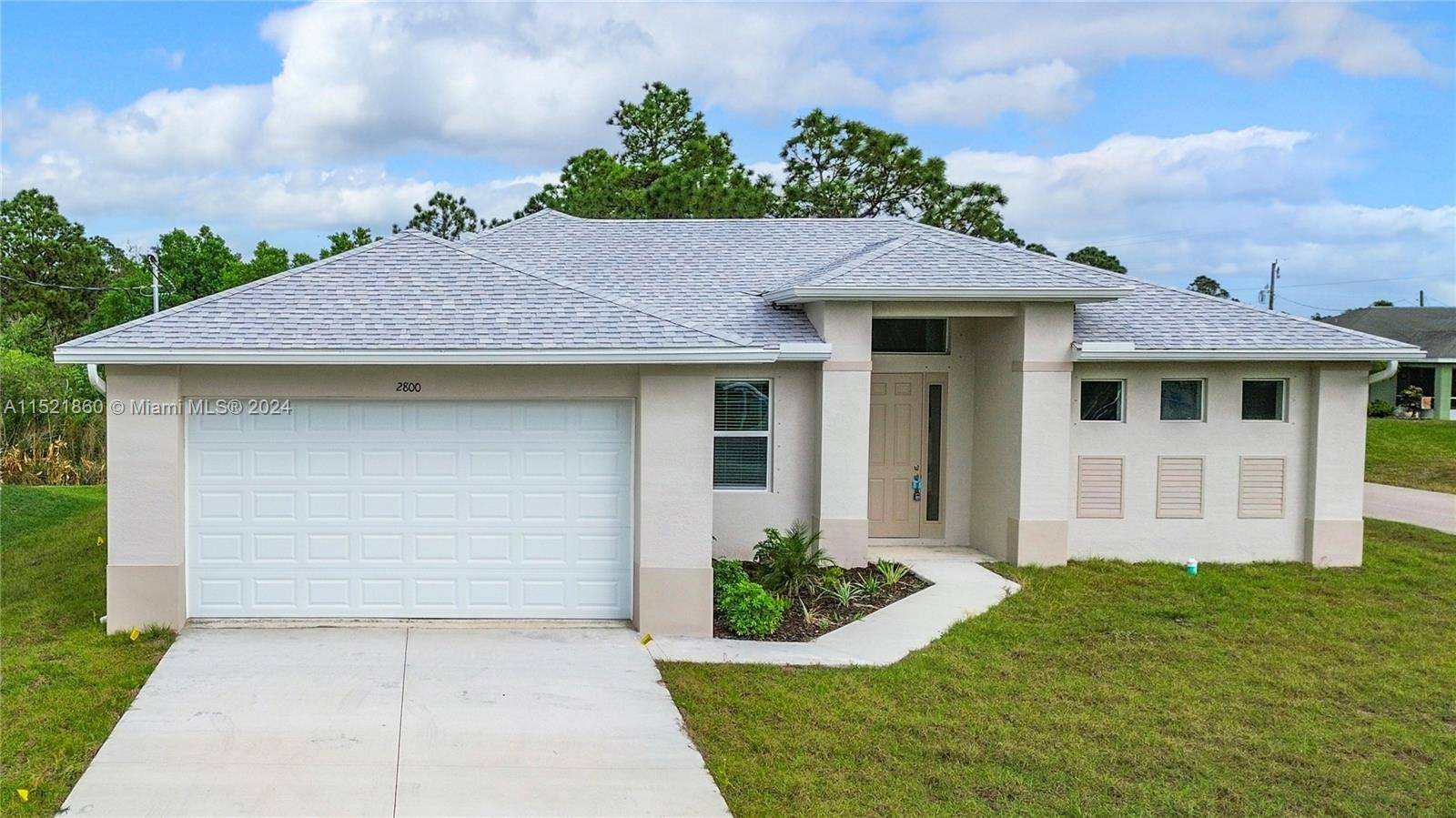 Welcome to modern elegance in the heart of Lehigh Acres !