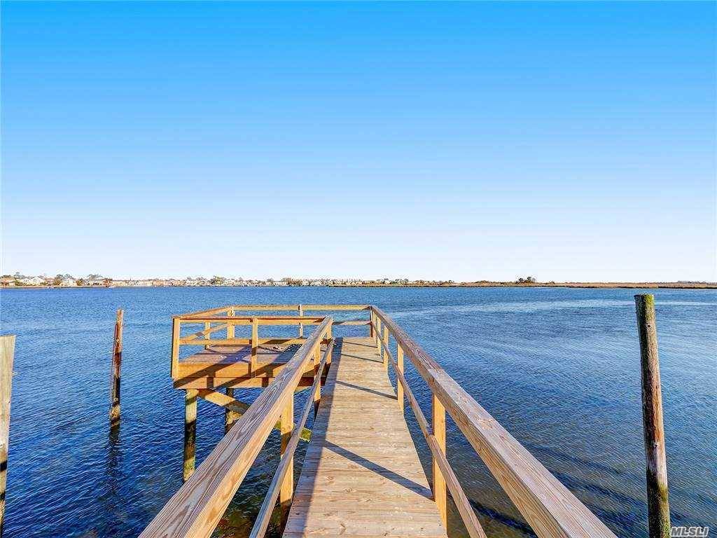 Offers Newly Renovated Luxury Living With Own Dock To The Open Water Front With Amazing Water View.