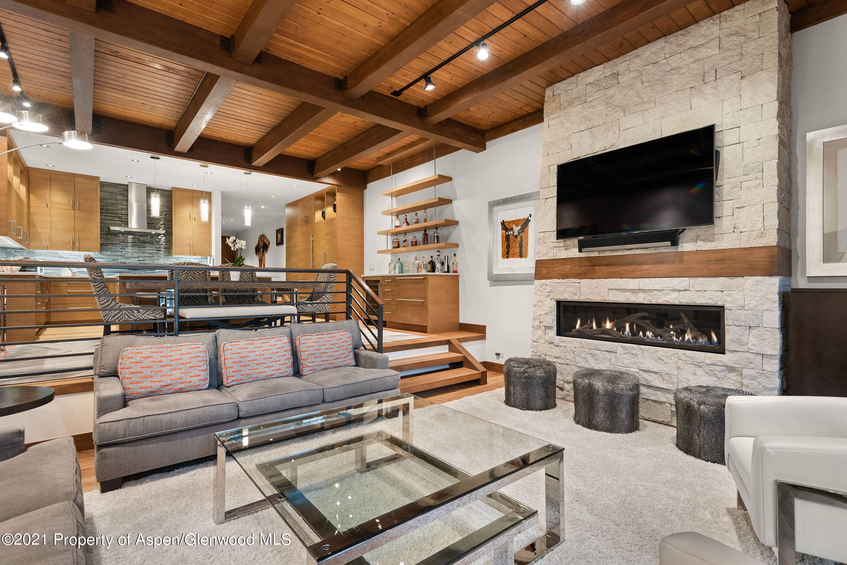 This ski access townhome was remodeled to the studs and offers an extraordinary mountain modern interior with high end finishes.
