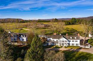 Prestigious Sharon Estate with Multiple Residences, Car Collector Horse Barns, Tennis House, picturesque grounds, and both eastern mountain western sunset views !