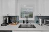 Kitchen w/View of Pool Area