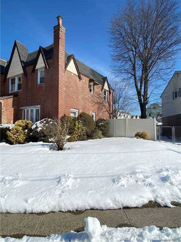 One of a kind Tudor Styled Colonial on extra lot Hardwood floors Updated Bath Exercise room finished Basement Eat in Kitchen Professionally landscaped Wont last Move in condition