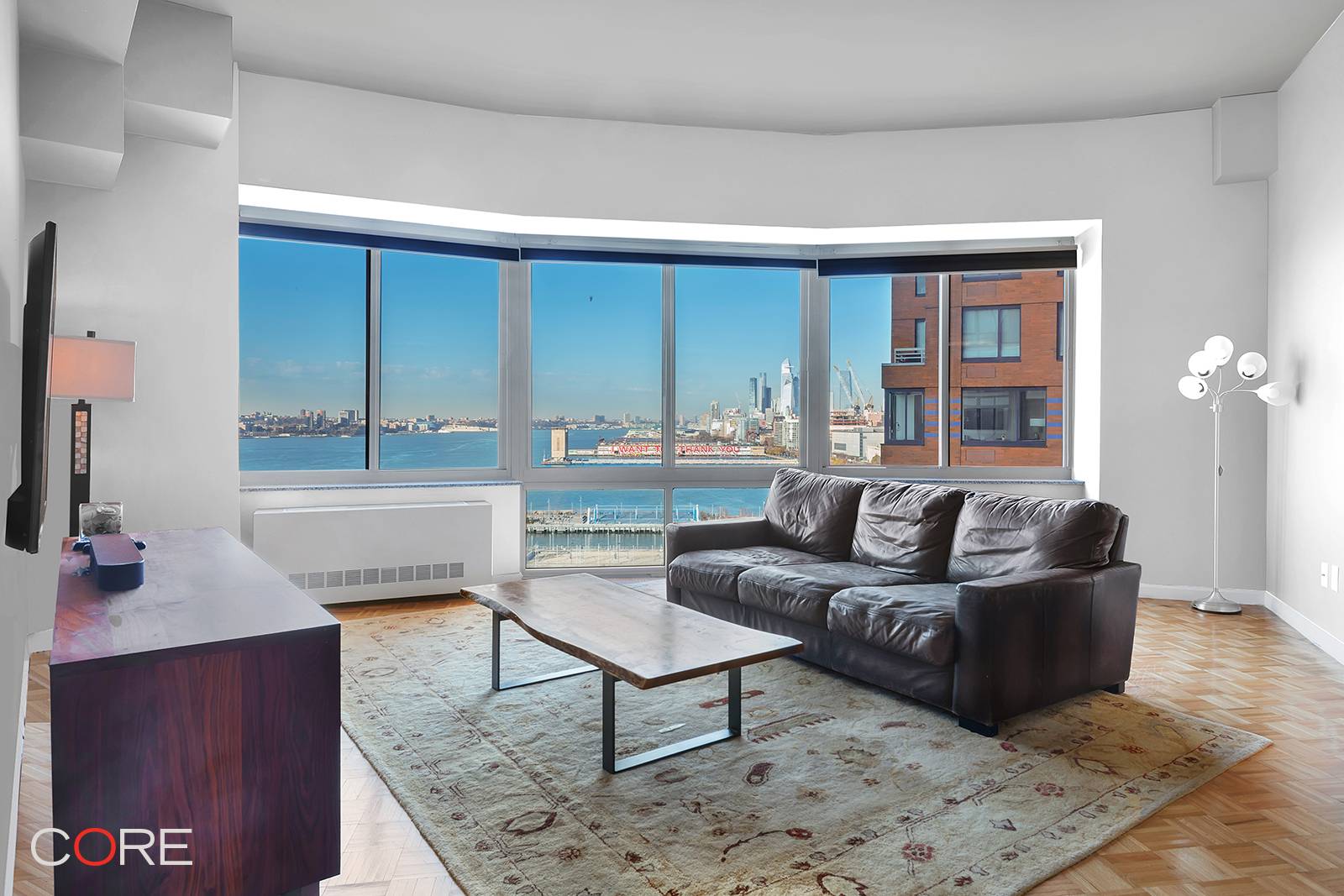 Perched on the 18th floor of Tribeca Park is this gorgeous three bedroom, three bathroom custom home with incredible northern views of the Hudson River.