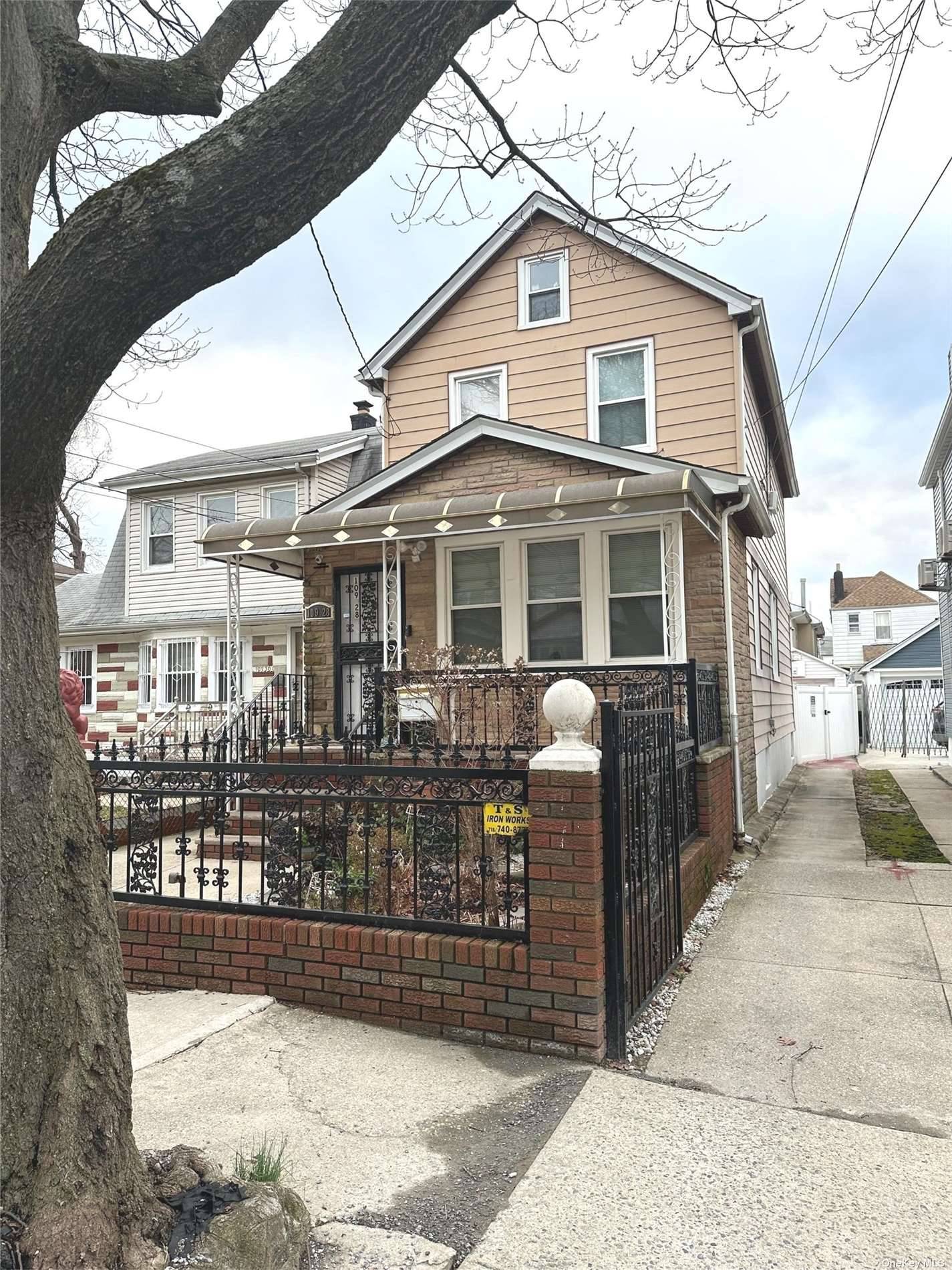Prime South Ozone Park ; offers a fully detached, single family home with a shared driveway.