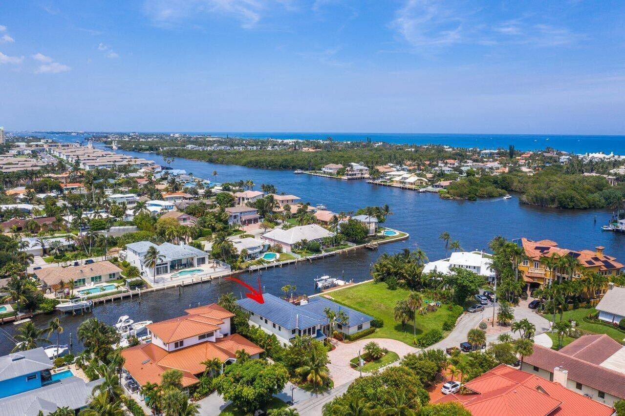 This waterfront paradise estate with striking intercostal water views will be your new perfect home.