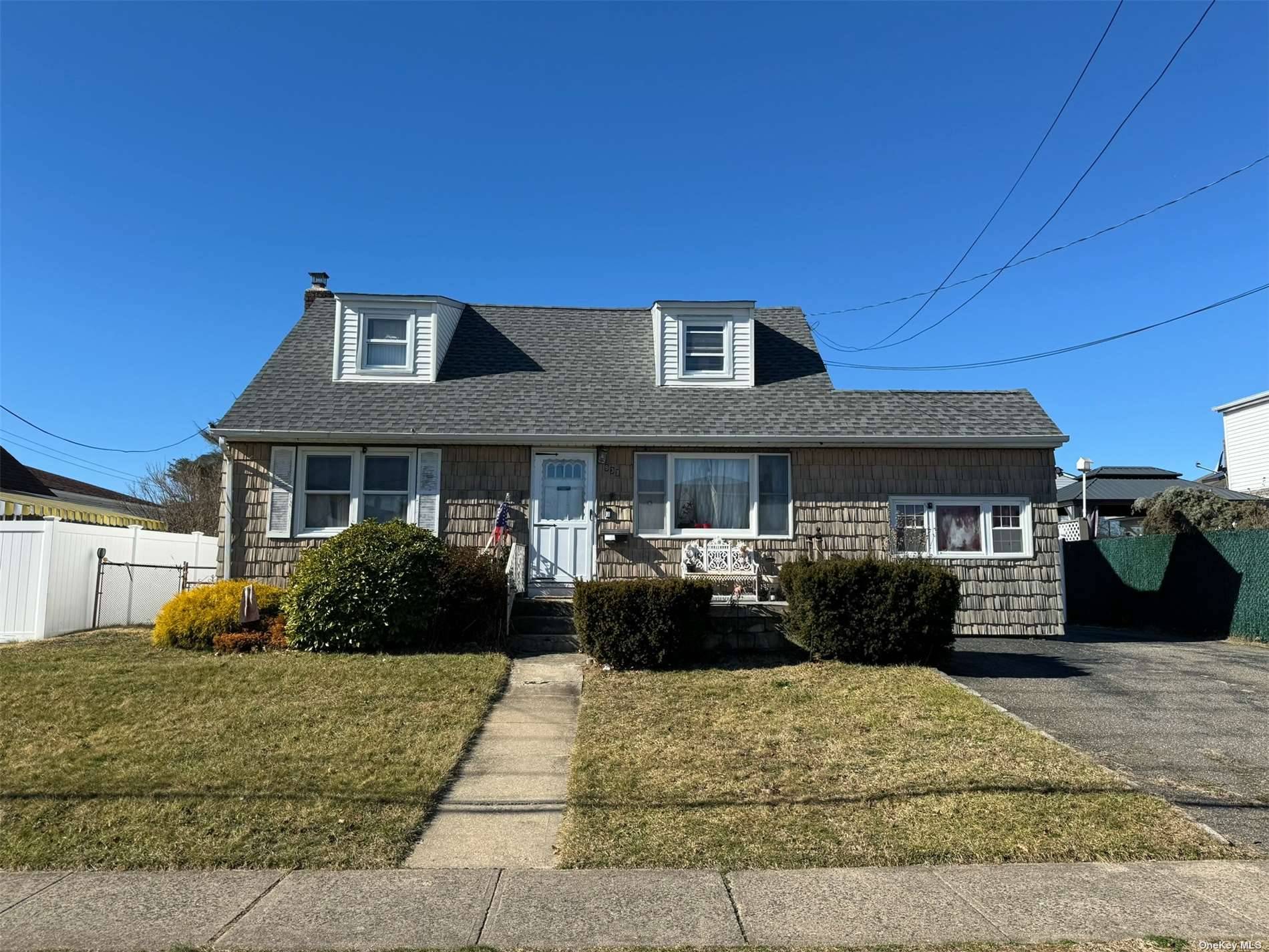 Expanded cape with so much potential located in very desirable area with Plainedge Schools.