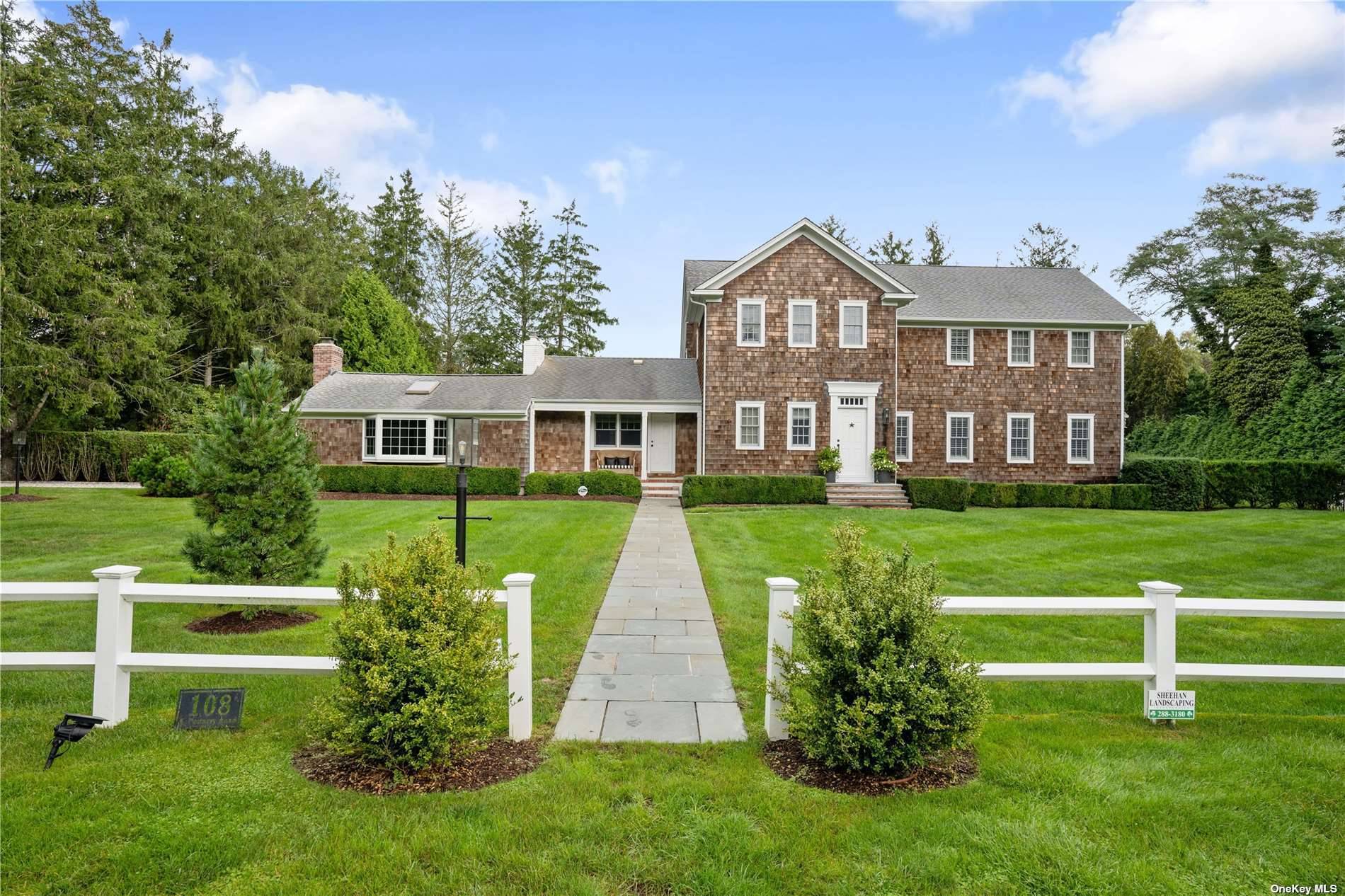 Nestled on one plus acres with mature landscaping and shade trees, this newly updated country estate is a designer showcase.