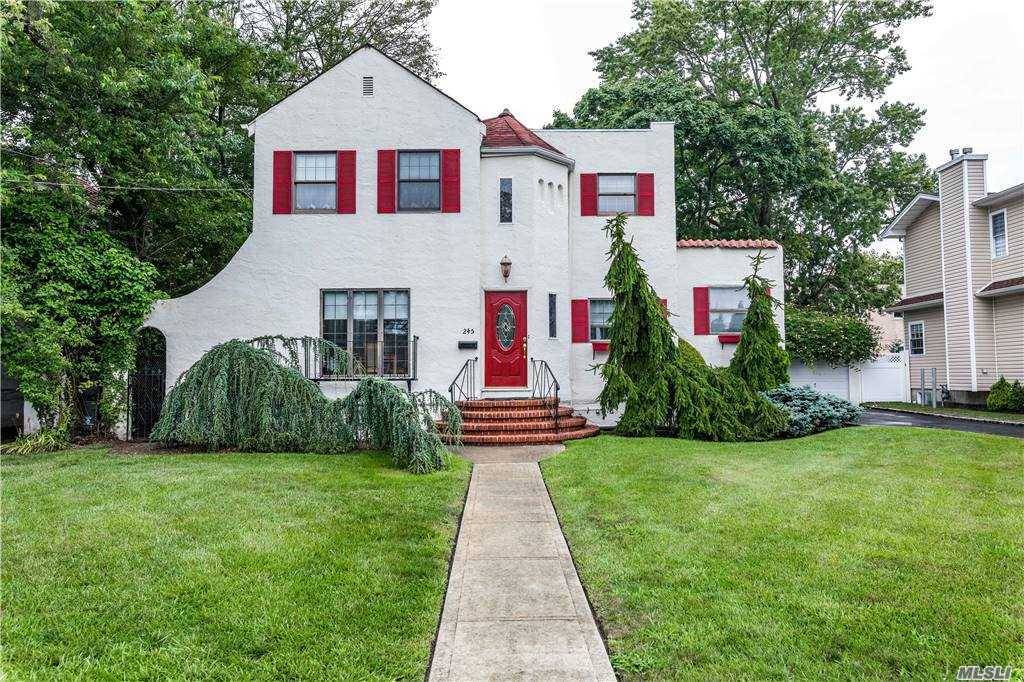 Elegant Hollywood Gables Colonial which Boasts Old World Charm with a Modern Flair !