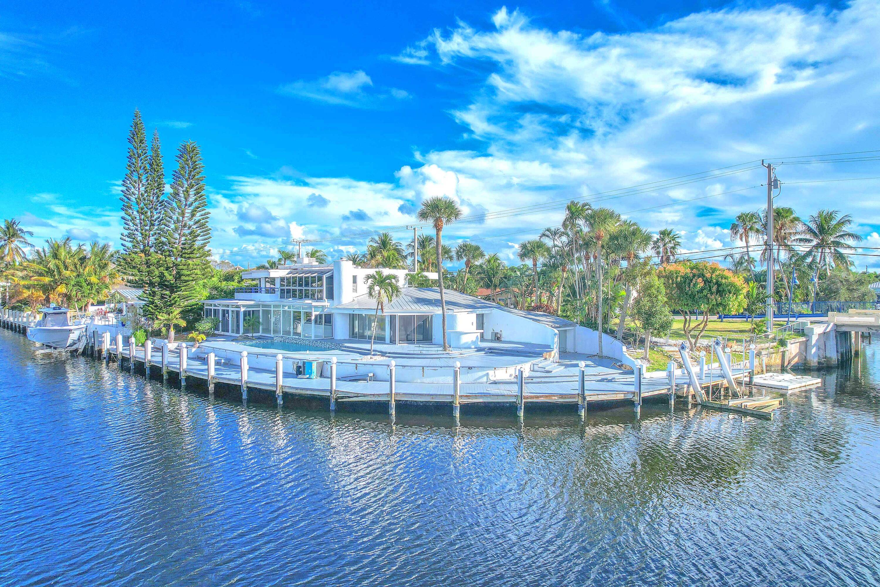 Extraordinary, rare deep water point lot at Venetian Isles in Lighthouse Point, close to 200 ft.