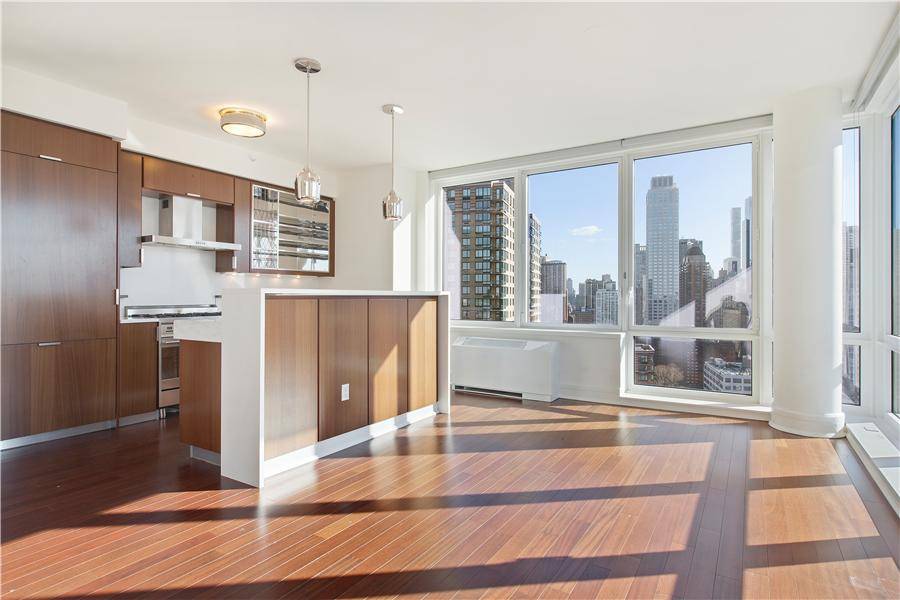 Exquisitely crafted by visionary designers, Roman and Williams, this corner 2 bedroom, two and a half bath boasts spectacular Hudson River and landmark skyline views.