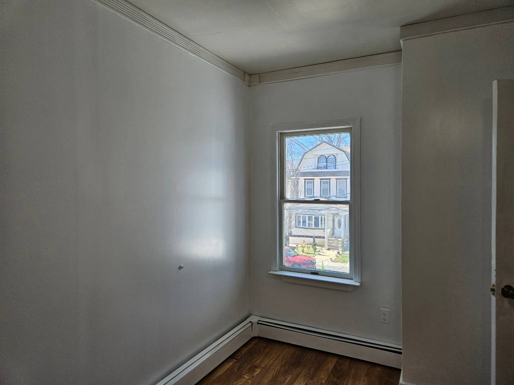 This apartment in Woodhaven, Queens, offers a comfortable living space with convenient access to transportation and amenities.